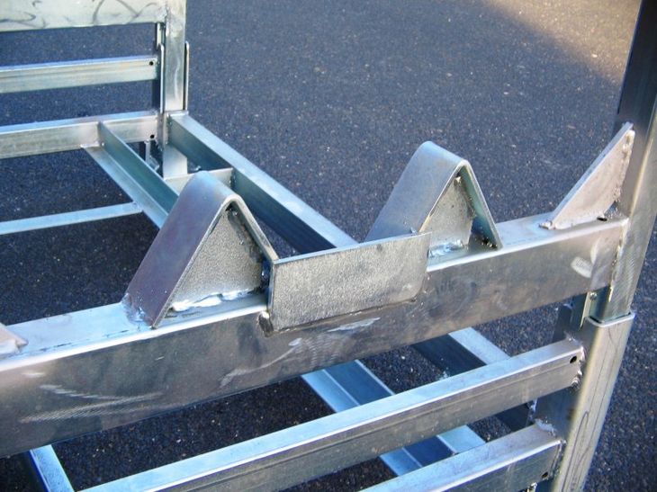 Detailansicht der Kernrohraufnahme mit verschweißtem Sicherungsblech als Durchschiebesicherung zum Schutz des Rollenspiegels