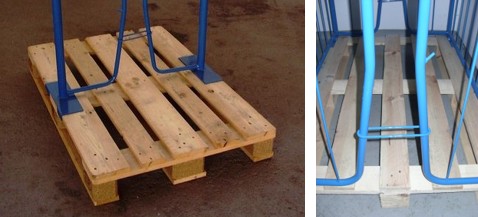Holzpalette mit blauen Aufsatzgestellen